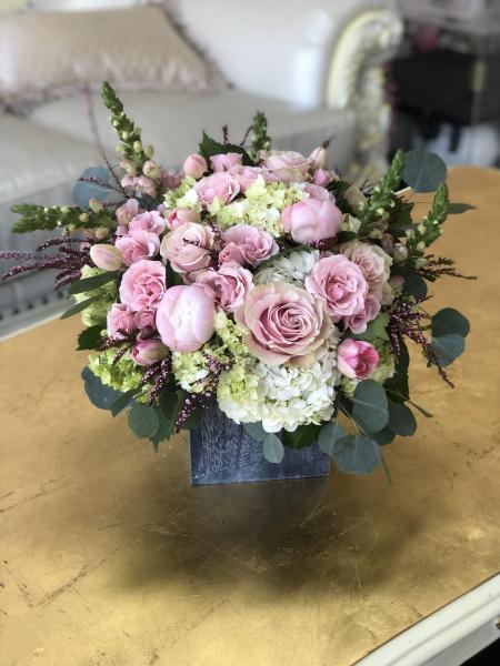 Romanic shades of pink in a gold leaf-lined vase.